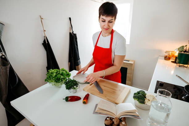 istock Preparing lunch according to the recipe 2078072647