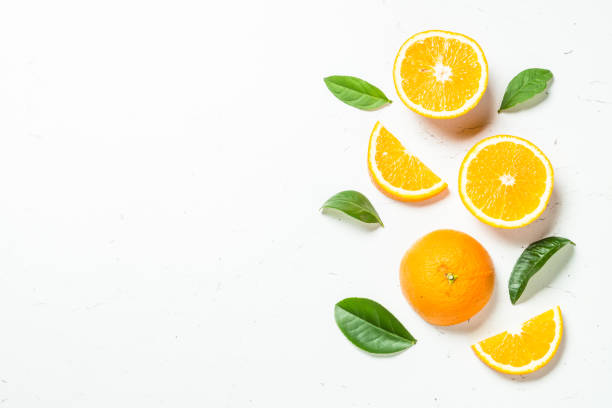 Citrus fruits at white background.