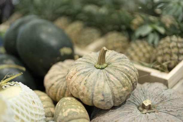 Beautiful yellow pumpkins for sale at a farm.