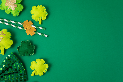 St. Patrick’s Day composition on green background