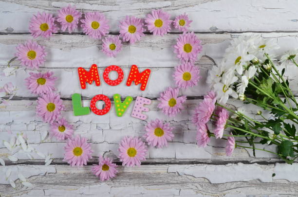 istock Greeting card with heart made from pink flower. 2078129545