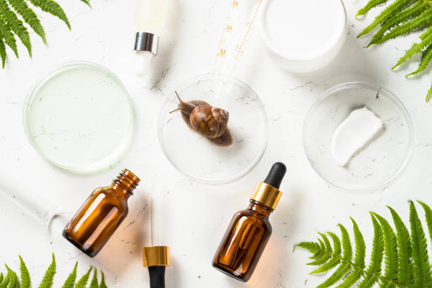 istock Snail mucin products at white background. Natural cosmetic. 2078130211