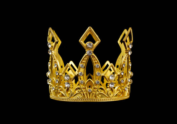 istock Gold crown isolated on black 2078159512