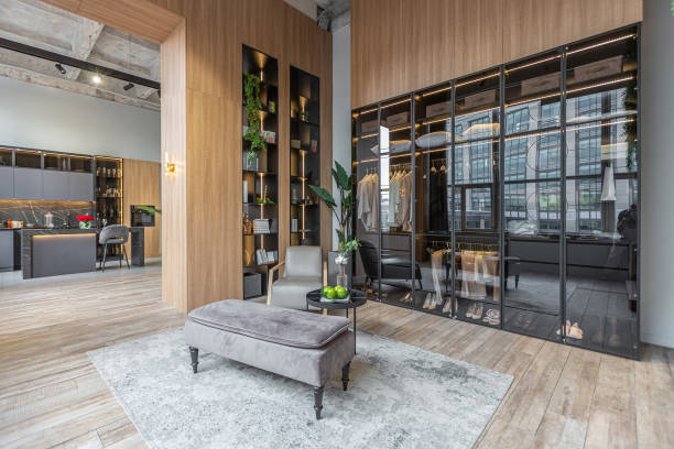 istock stylish dressing room with led lights in huge modern spacious apartment with high loft style ceilings, wooden decoration and grey walls 2078165247