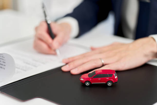istock Businessman signing a car contract 2078181674