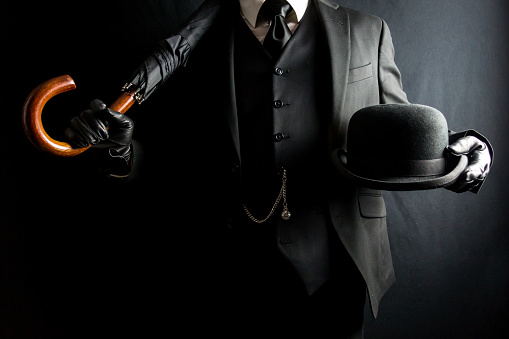 British Gentleman in Suit With Bowler Hat and Umbrella