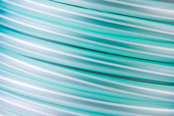 Oxygen tubing hose component for controlled delivery of medical-grade oxygen as background