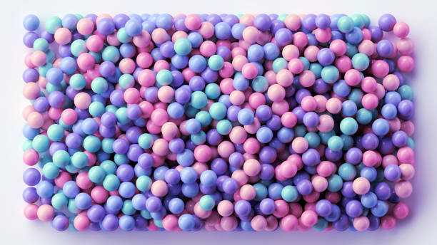 istock 3d render, abstract background of assorted pink violet blue balls, pastel pills or dragee 2078242582