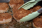 Minced cutlets fried in a pan, turned over