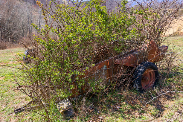 istock Old farming implement left to the elements in rual Virginia, USA 2078247016