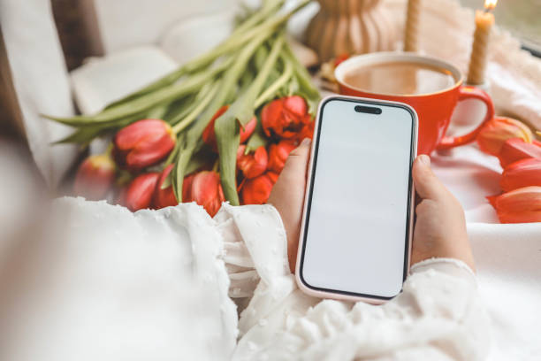 istock Phone with isolated screen on background of spring decor 2078248702