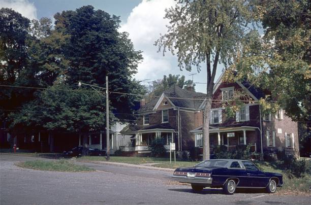 Woodland, Union County, Ohio, 1976. Suburb with houses and a parked car in Union County.