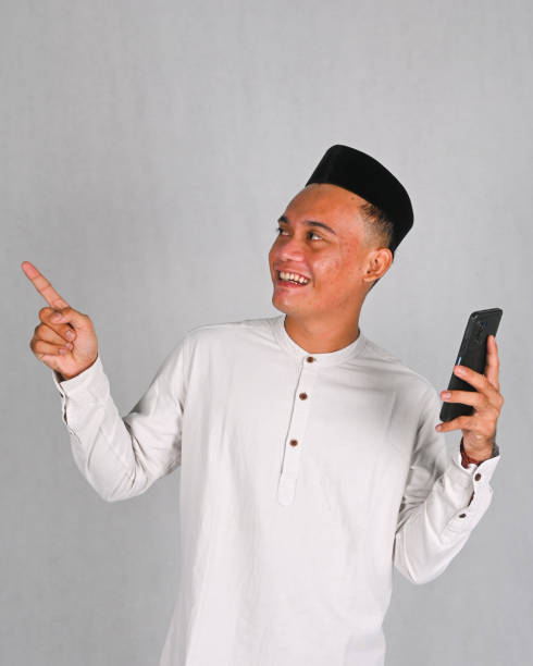 istock Asian men have various expressions when looking at their phones 2078259462
