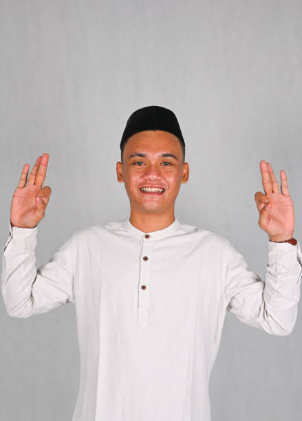istock Asian young man excited and pointing up 2078264827