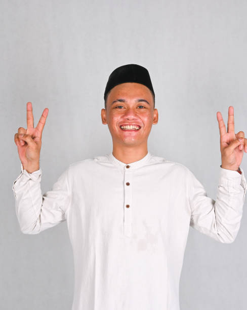 istock Asian young man excited and pointing up 2078266940