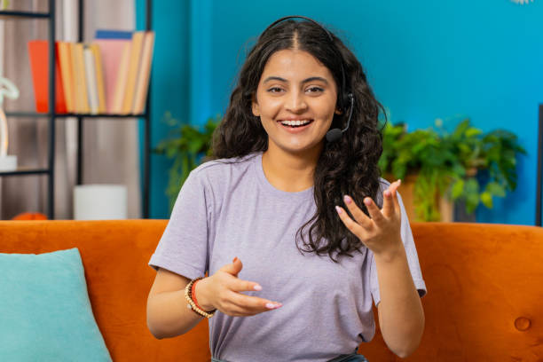 istock Indian woman freelance worker call center, support service operator helpline having talk with client 2078273223