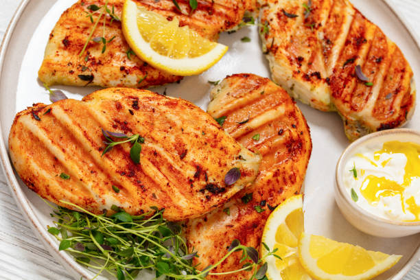 istock juicy grilled chicken cutlets on plate, top view 2078289948