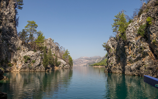 Green Canyon in Turkey, the city of Manavgat. Taurus Mountains and an artificial lake-reservoir. Excursions to Green Canyon