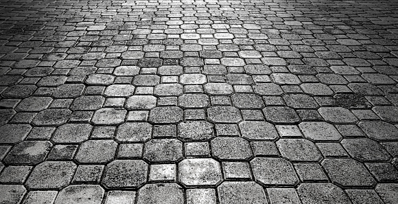 Old paving slabs grey background
