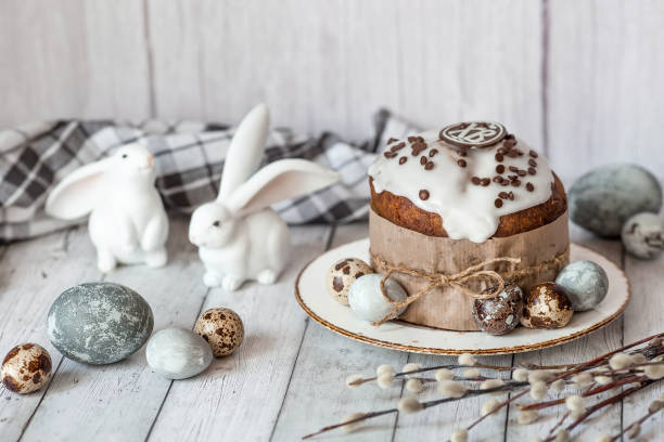 istock Stylish grey Easter eggs in the colors of marble, concrete, willow branches, Easter bunnies and Easter cake on a white wooden background. Coloring eggs for Easter. Environmental friendliness. Naturalness. The feast of bright Easter. 2078311652