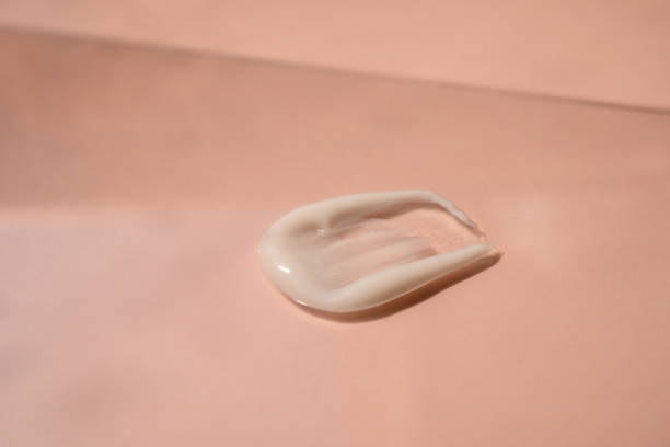 istock A smear of cream on a light background. Beauty concept. 2078320339