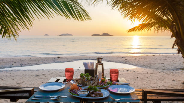 istock dinner table on the beach at sunset on the Island Koh Chang Thailand 2078331370