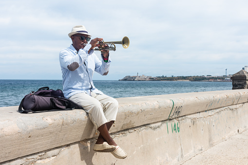 Musician on the Malecón, Cuba