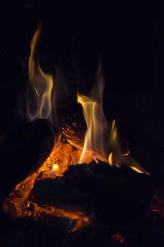 Bonfire with flames in a home.