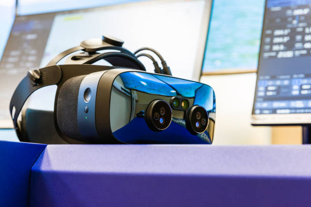 istock VR headset with cameras of the augmented reality lays on the desk 2078371161