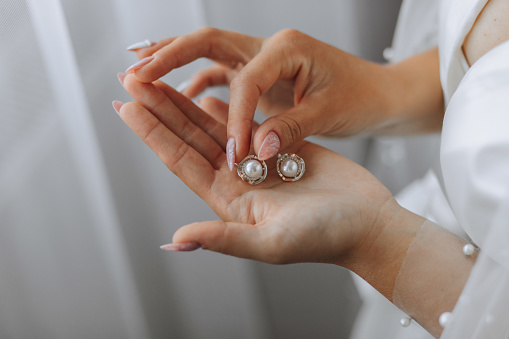 Gold ring and bracelet on a woman hand