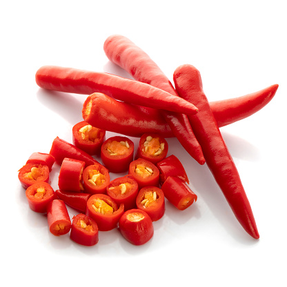 Sliced red hot chili peppers and Red chilli pepper isolated on a white background