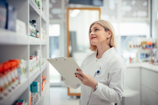 istock Woman Pharmacist Working at Pharmacy 2078391468
