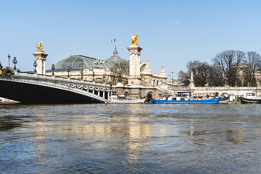Paris  : flooding of the Seine quayside in Paris. with Alexandre III bridge and Grand Palais in background. March 7, 2024