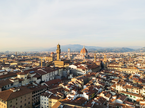 Aerial view of Florence's skyline at sunset. Santa Maria del Fiore and other famous buildings in Florence, Tuscany, Italy.
