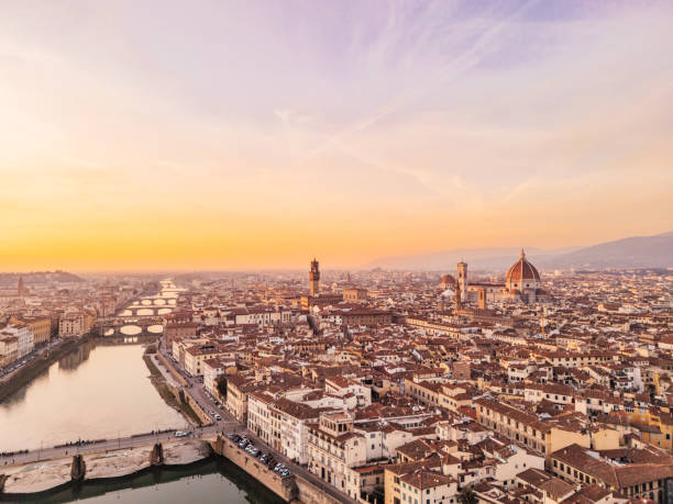 Aerial view of Florence's skyline at sunset. Panoramic aerial view with Duomo Santa Maria del Fiore and other famous buildings in Florence, Italy.
