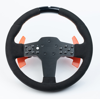 Black sport car steering wheel with shifting paddles isolated