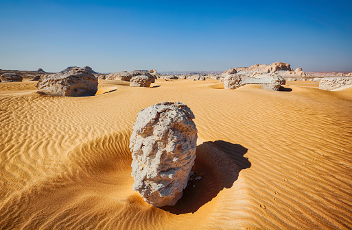 An unidentified 4x4 van in the middle of the dunes near erg Chegaga