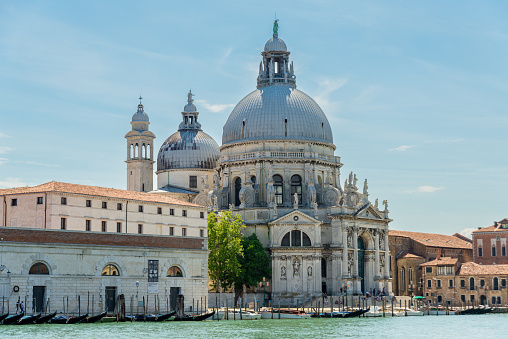 Venice, Veneto - Italy - 06-10-2021: Breathtaking view of Santa Maria della Salute, Venice's historical baroque church