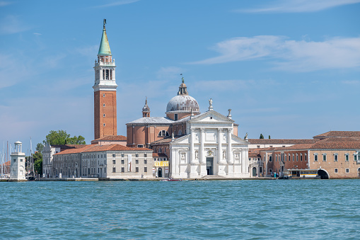 Venice, Veneto - Italy - 06-10-2021: San Giorgio Maggiore church rises against the sky on its namesake island in Venice