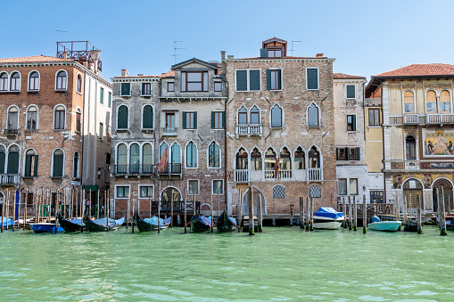 Beautiful canal with old medieval architecture in Venice, Italy. View of Grand Canal and gondola. Famous travel destination