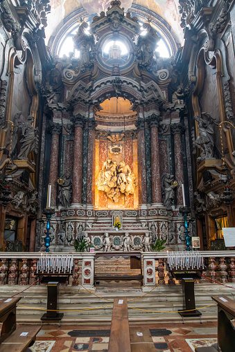 Venice, Veneto - Italy - 06-10-2021: Lavish Baroque church interior in Venice, with elaborate marble altar