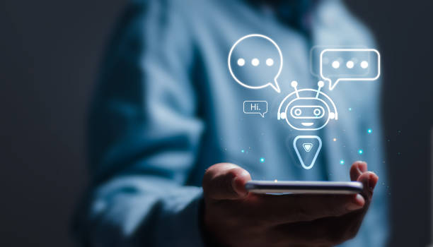 istock AI technology, Businessman use smartphone with virtual screen of AI chatbot communicate and answer questions. Artificial intelligence solves problems and assists human decision-making for users. 2078480657