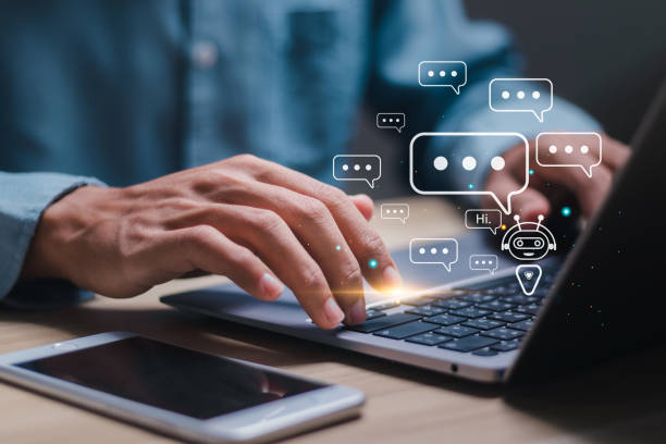 istock AI technology, Businessman use laptop with virtual screen of AI chatbot communicate and answer questions. Artificial intelligence solves problems and assists human decision-making for users. 2078495083