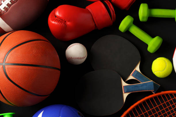 istock Various sports equipment on black background studio shot 2078495090