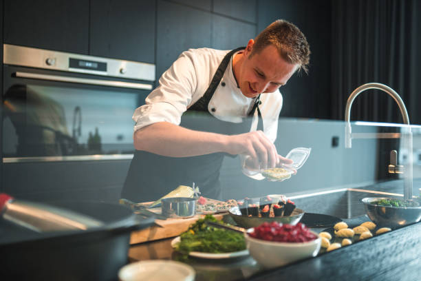 istock Talented Young Chef in Professional Uniform Creating Gourmet Delights 2078502971