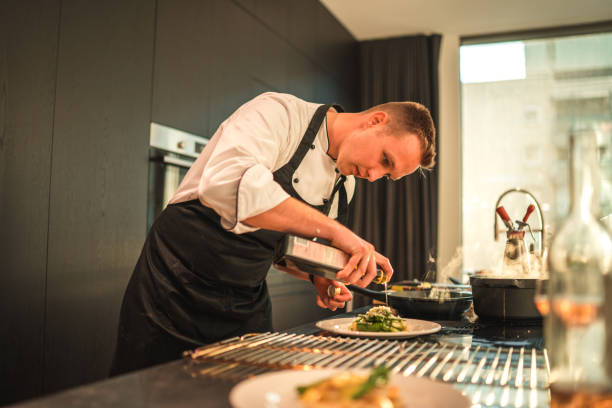 istock Professional Chef Masterfully Plating Delicious Cuisine 2078504029