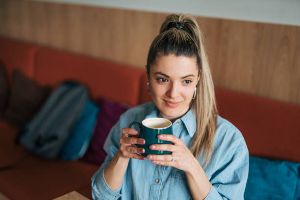 istock Young female drinkig coffee 2078506679