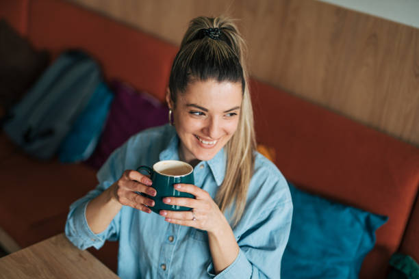 istock Young female drinkig coffee 2078507725
