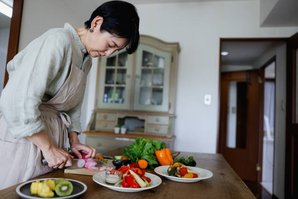 istock Woman making vegan food 2078510309
