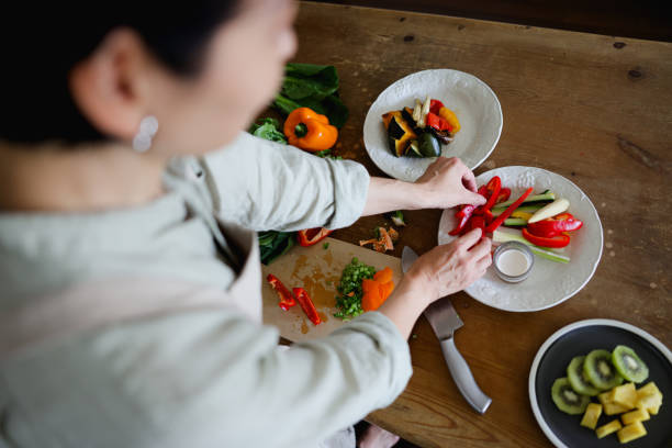 istock Woman making vegan food 2078524406